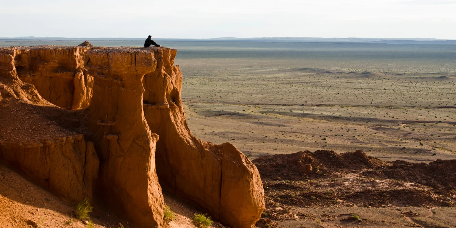 Walker enjoying views from the flaming cliffs, Mongolia.