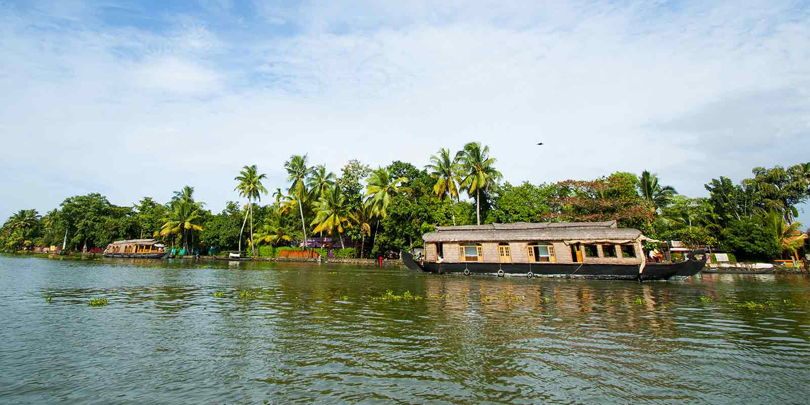 Traditional houseboat on the backwaters in Kerala, India