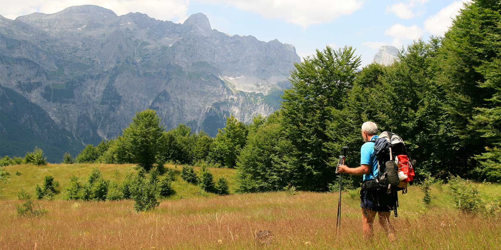 Trekker in the Thethi meadows Albania