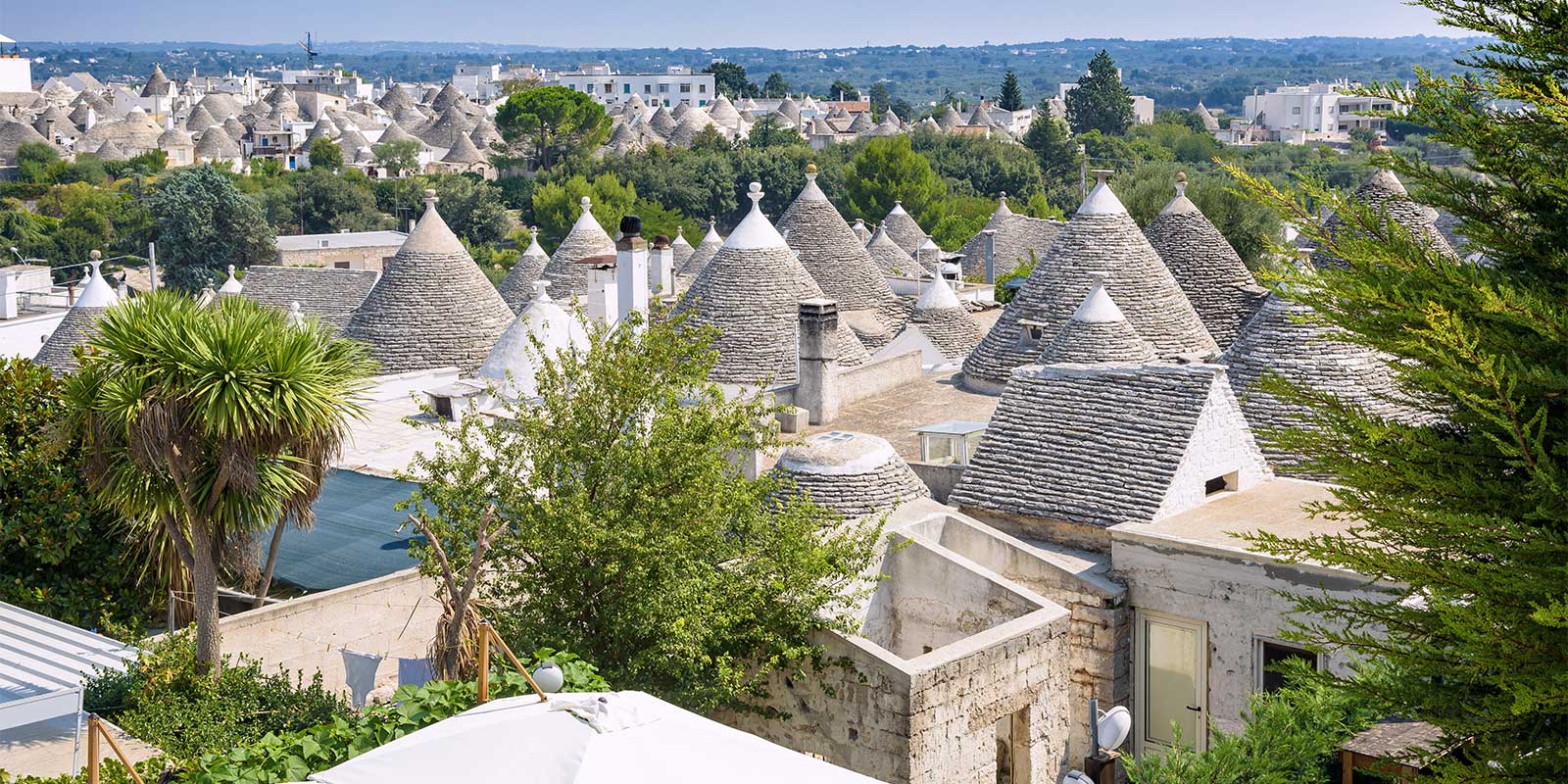 White Trulli houses in the town of Alberobello in Italy