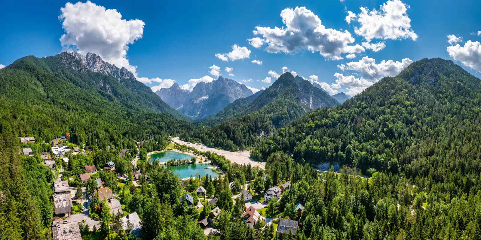 View of the Slovenian Alps with Jasna Lake in the valley.