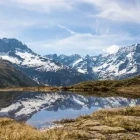 View of Lake Lauzon with the Cirque du Gioberney in the background, France.