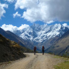 People walking on the Salkantay trail in Peru. 