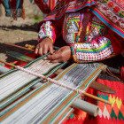 A woman weaving fabric in Peru. 