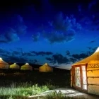 Group of gers at night, in Mongolia.