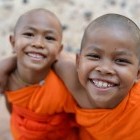 Young monks smiling at camera