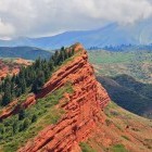 Red sandstone rock formations in Seven Bulls Gorge,  Kyrgyzstan