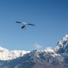 Microflight in Annapurna range with Machapuchare summit in Himalayas Nepal