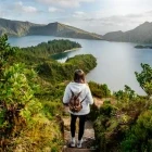 Hiker looking at Lagoa do Fogo in the Azores