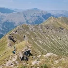 Hikers traversing a ridge in the Visocica Mountain Range, Bosnia & Herzegovina