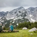 Walkers enjoying the view of Maglic peak, at Sutjeska National Park, Bosnia & Herzegovina