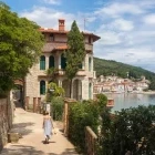 Lady walking in Moscenicka Draga, Croatia