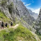 Group of walkers exploring the Ruta del Cares Canyon, in Spain.