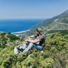 Man looking down to Ionian Coast in Albania