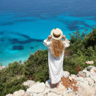Woman looking down to Ionian Coast in Albania