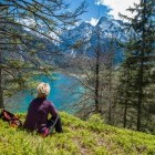 Hiker resting in mountains of Austrian Alps