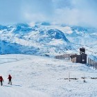 Pair snowshoeing in the Dachstein Krippenstein, Austria