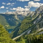 View from Gosaukamm cable car into Gosau Valley and the Dachstein Mountain Range in Austria