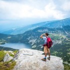 Hiker overlooking Seven Rila Lakes in Bulgaria