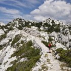 Hiker on the Premuzic's Trail in Velebit Mountains