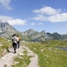 Hikers approaching Midi d'Ossau in the French Pyrenees