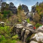 Hiker on Bastei Bridge in Saxon Switzerland National Park