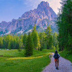Hiker near Lago di Sorapis in the Dolomites, Italy
