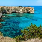 Torre Sant Andrea cliffs and rocky arch in Salento, Italy