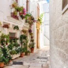 Traditional white buildings in Cisterno, Italy
