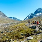 Hikers walking through Svartdalen in Norway