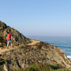 Hiker at Porto Covo in Portugal