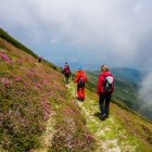 Hikers following a mountain path in Romania
