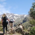Hikers on the GR7 trail in the Sierra Nevada mountains
