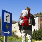 Pilgrim near Palas de Rei village in Spain on the Camino Way