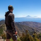 Hiker admiring the view of Mount Teidfe from La Gomera, the Canary Islands