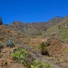 Hiker heading into mountains on the Island of Gomera in the Canary Islands