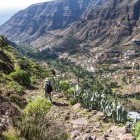 Hiker on the slopes of Valle Gran Rey in La Gomera, the Canary Islands