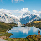 Hiker at Lake Bachalpsee in Grindewald, Switzerland