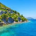 Boat sailing past Kekova Island in Turkey