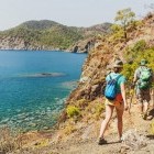 Hikers following a coastal trail on the Lycian Way