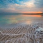 Dead sea coastline at sunset in Jordan