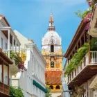 Vibrant balconies leading to the cathedral in Cartagena.