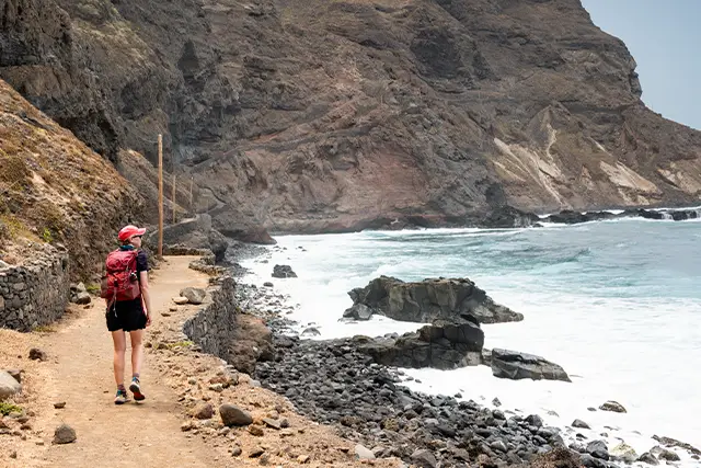 Journalist Sarah Baxter in Cape Verde on a hiking holiday, walking along the coast.
