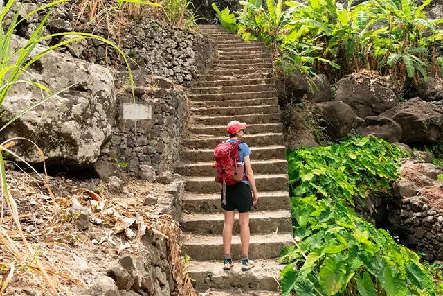 Journalist Sarah Baxter in Cape Verde on a hiking holiday, stood at the bottom of some steps.