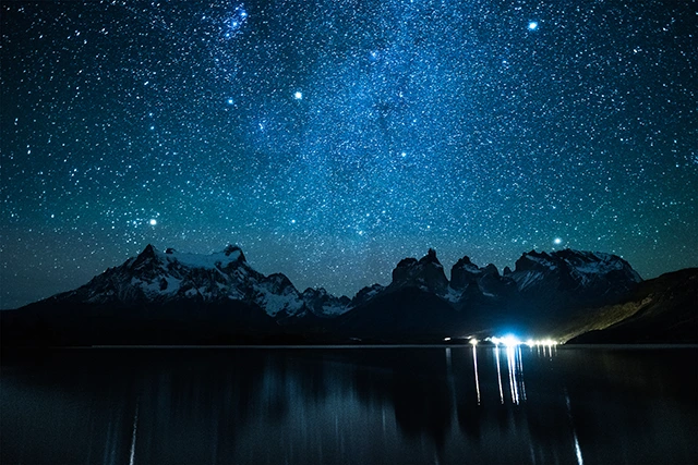 Night sky over Torres del Paine & Lake Pehoe in Chile