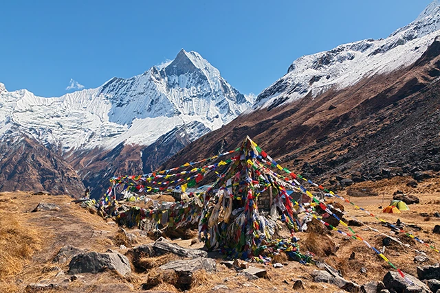 View of Machhapuchre & prayer flags in Annapurna, Nepal