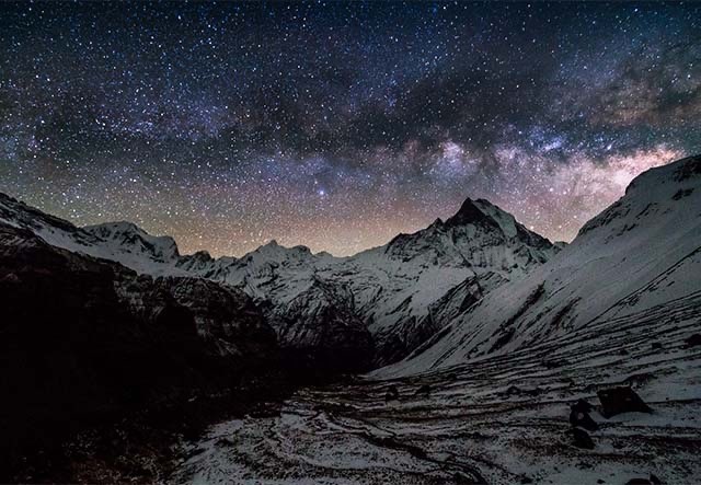 Milky way over Machapuchare peak in the Himalayas, Nepal