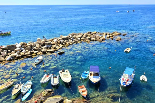 The sea defence and boats of Riomaggiore, Italy.
