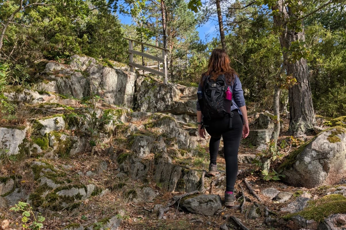 Team member Rhiannon walking to a viewpoint on Orno Island on the Stockholm Archipelago in Sweden.
