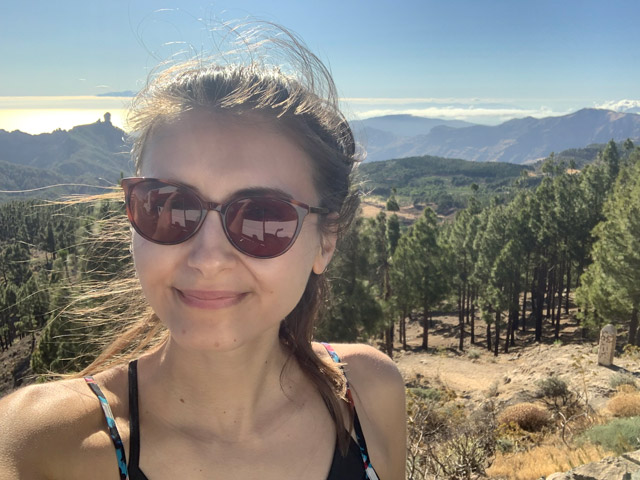 Katie from the Marketing Team with Pico de las Nieves & Mount Teide in Gran Canaria, the Canary Islands in the background